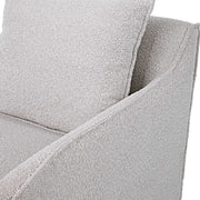 Gray Welland swivel chair by Uttermost with a modern design, featuring a cushioned seat and a swivel base.