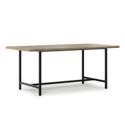 Handcrafted Simpli-Home Campbell dining table with wooden surface and sturdy legs, ideal for modern dining rooms.