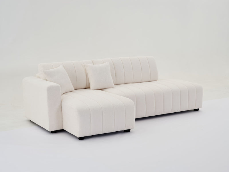 Urban Retreats Jessica lamb wool sectional sofa with chaise in versatile configuration, featuring plush upholstery and modern design.