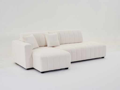 Urban Retreats Jessica lamb wool sectional sofa with chaise in versatile configuration, featuring plush upholstery and modern design.