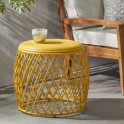 Noble House Alamera side table with wooden top and metal frame, modern design, placed beside a sofa in a stylish living room.