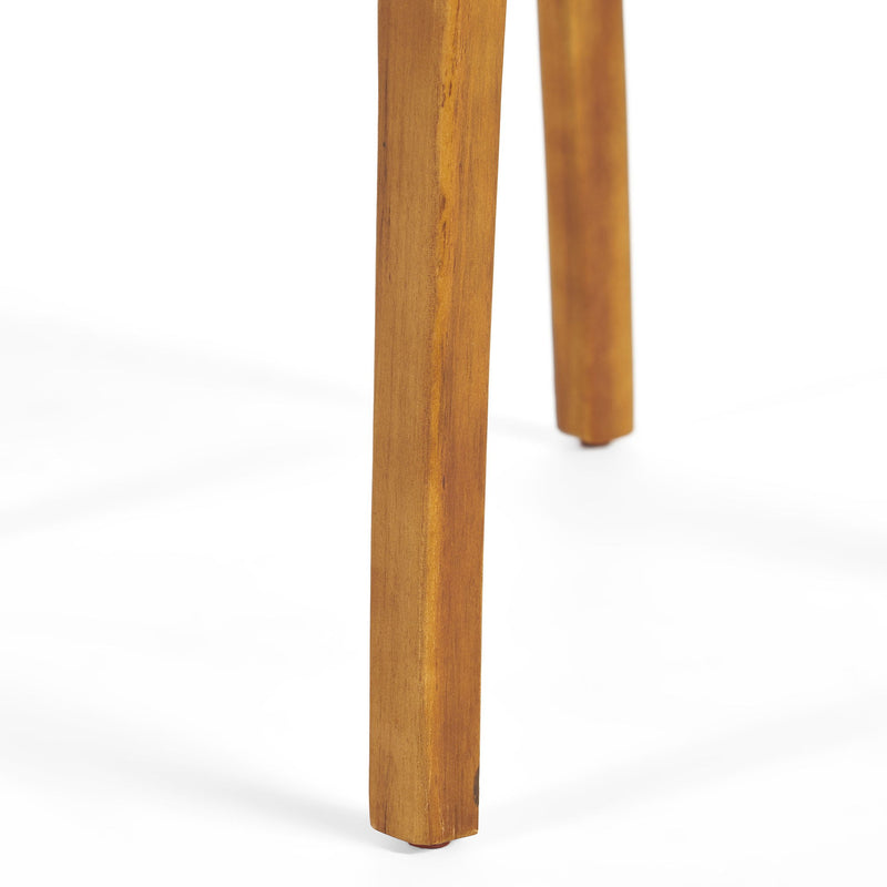 Set of two Noble House outdoor dining chairs with slat back design and acacia wood frames in gray and teak colors.