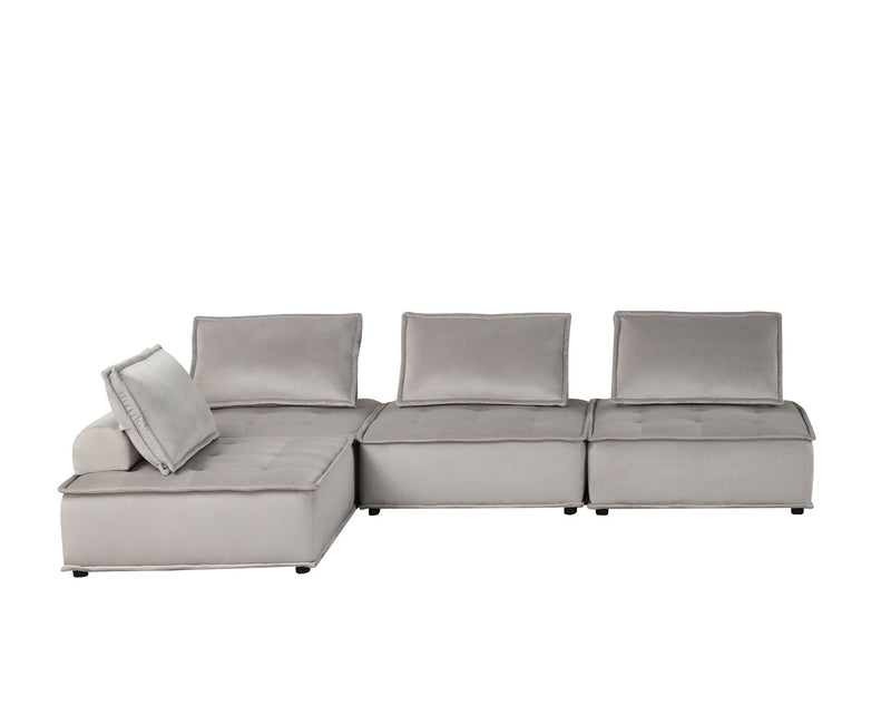 Lilola Home Anna stylish sectional sofa ottoman in a modern stationary sectional design, shown in a cozy living room setting.
