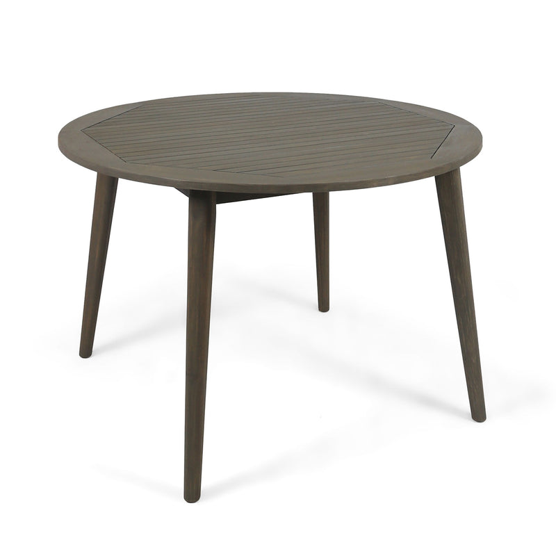Modern Noble House Stamford outdoor dining table with a sleek design, featuring a spacious surface ideal for outdoor meals.