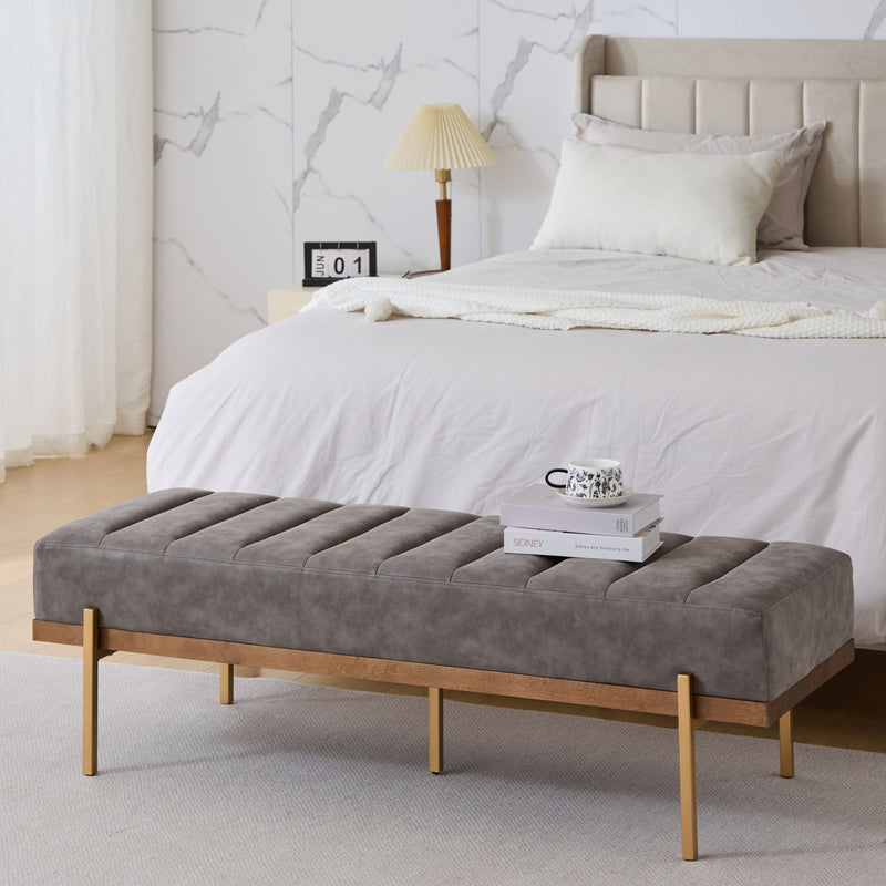 Noble House Thorian luxury upholstered ottoman bench with gold metal base, gray fabric, channel tufting, modern design.