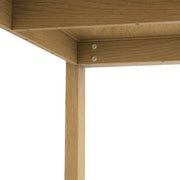 Wilson handcrafted dining table by Simpli-Home with a wooden surface and sturdy legs, ideal for family meals and gatherings.