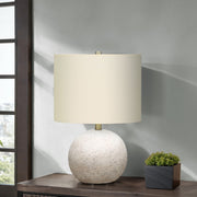 8th Street table lamp with a modern design, featuring a sleek base and fabric shade, providing ambient lighting for any space.