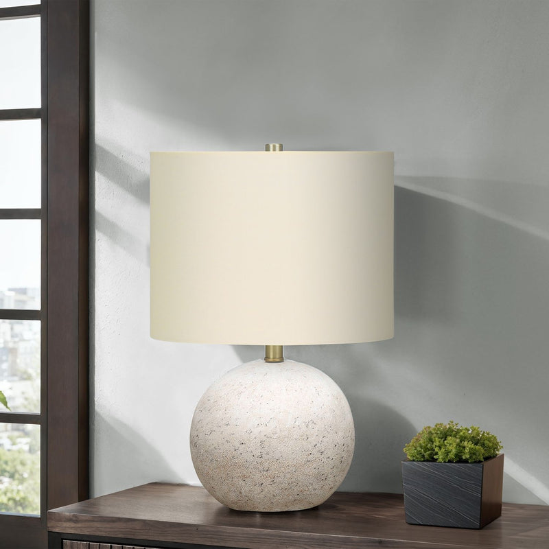 8th Street table lamp with a modern design, featuring a sleek base and fabric shade, providing ambient lighting for any space.