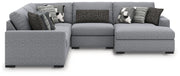 Benchcraft Bealton stationary sectional sofa with plush cushions and modern design, shown in a cozy living room setting.