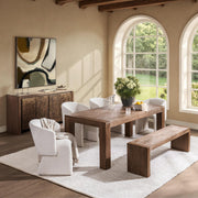 Classic Home Glendale dining table in toasted chestnut finish with a sleek wooden surface and sturdy legs.