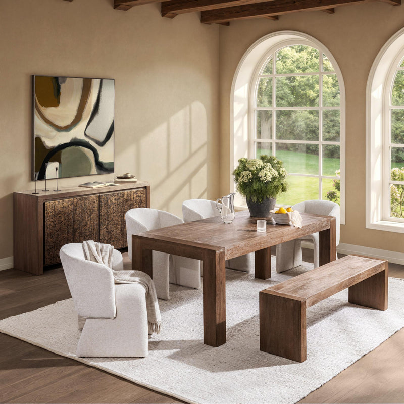 Classic Home Glendale dining table in toasted chestnut finish with a sleek wooden surface and sturdy legs.
