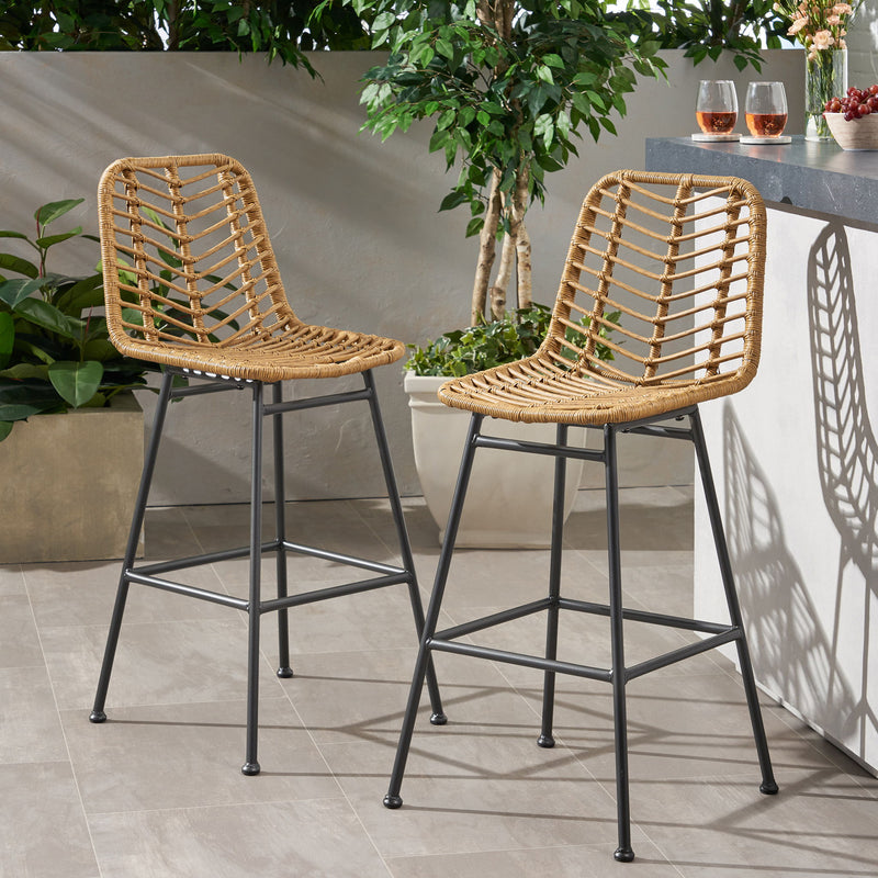 Set of two Noble House Sawtelle outdoor wicker barstools with armrests and woven seats, perfect for patio or outdoor bar area.