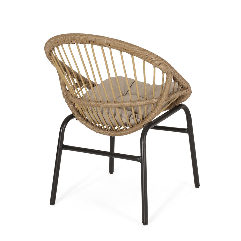 Set of 2 Noble House outdoor accent chairs with curved backs and basket frames in light brown and beige.