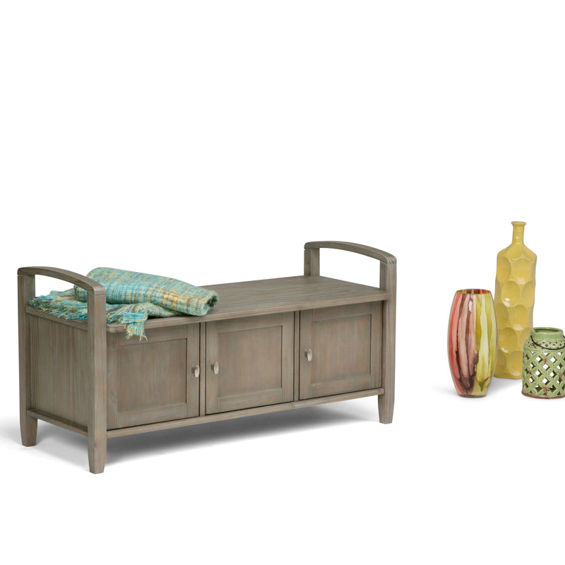 Handcrafted Warm Shaker entryway storage bench by Simpli-Home with a wooden finish and cushioned seat.