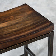 Beck industrial counter height bar stool by Uttermost with metal frame and wooden seat, 24-27 inches tall for kitchen or bar area