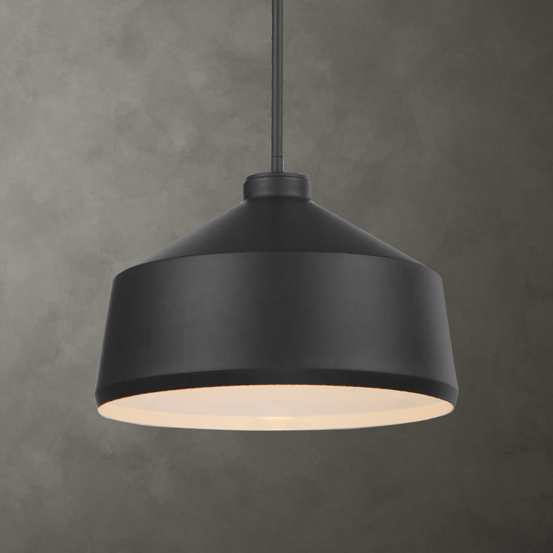 Uttermost Holgate 1-light black pendant light hanging from ceiling, modern pendant lighting fixture with sleek black finish.