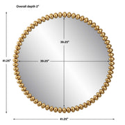 Gold Byzantine round wall mirror with ornate frame, decorative design, and reflective glass, by Uttermost.