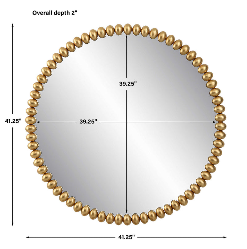 Gold Byzantine round wall mirror with ornate frame, decorative design, and reflective glass, by Uttermost.