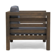 Noble House outdoor acacia wood patio arm chair with fabric cushion, showcasing a sturdy wooden frame and comfortable seating.