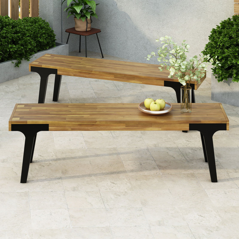 Set of two Noble House teak dining benches with smooth wooden seats and sturdy legs, perfect for kitchen or dining room.