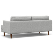 Simpli-Home Livingston upholstered stationary sofa with plush fabric and cushioned armrests in a modern living room setting.