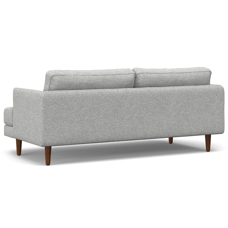 Simpli-Home Livingston upholstered stationary sofa with plush fabric and cushioned armrests in a modern living room setting.