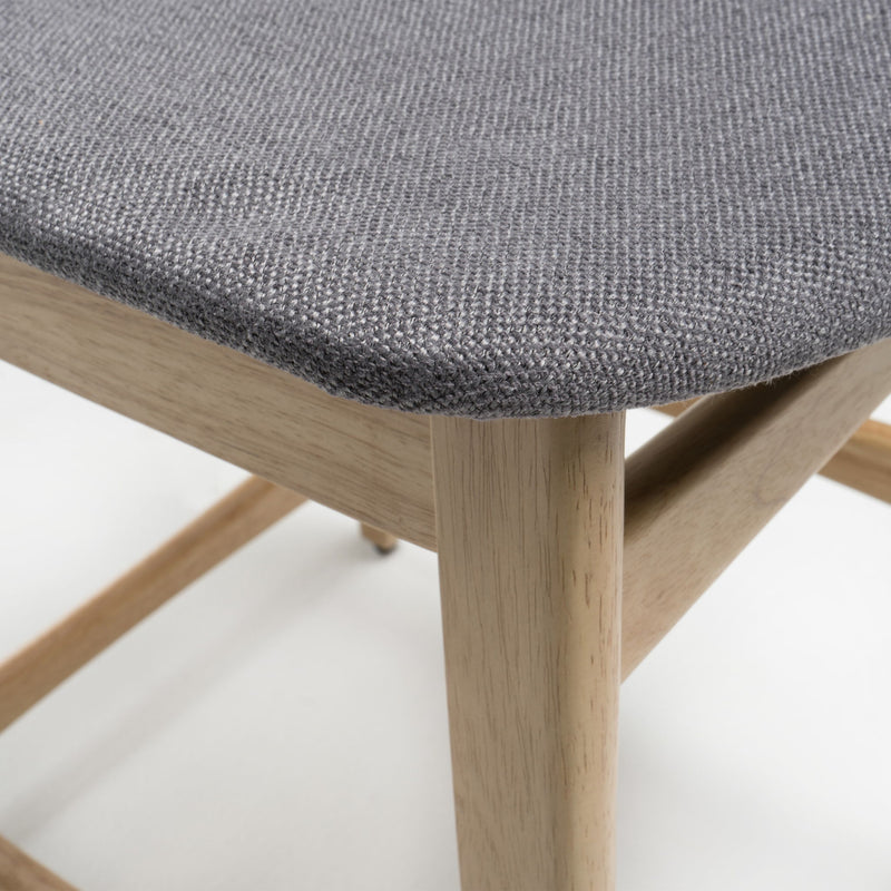 Set of two Noble House retro modern counter height stools with cushioned seats and wooden legs, ideal for kitchen or bar area.