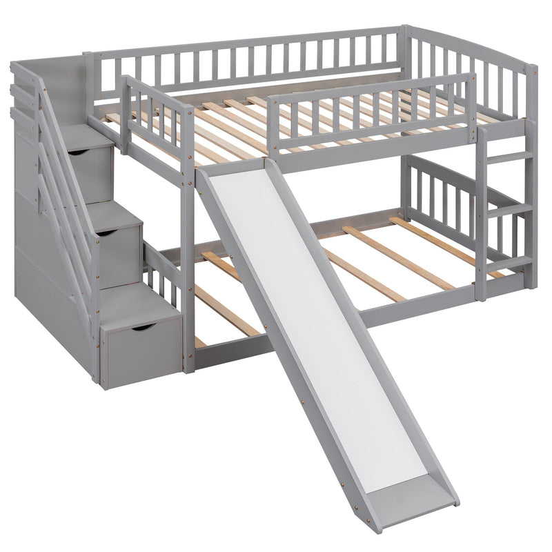 Gray DreamHaus twin over twin bunk bed with stairway, built-in drawers, and slide, ideal for space-saving bedroom furniture.