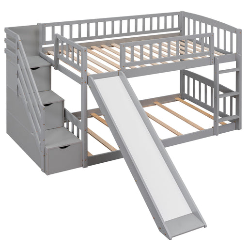 Gray DreamHaus twin over twin bunk bed with stairway, built-in drawers, and slide, ideal for space-saving bedroom furniture.
