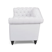 Noble House Chesterfield style 3-seater sofa with deep button tufting, stationary design, upholstered in elegant fabric.