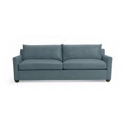 Classic Home Olivia stationary sofa with plush upholstery and elegant design, shown in a modern living room setting.