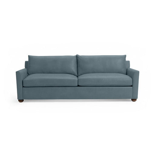 Classic Home Olivia stationary sofa with plush upholstery and elegant design, shown in a modern living room setting.