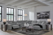 Salt and pepper reclining sectional sofa from Signature Design by Ashley® with plush cushions and modern design.