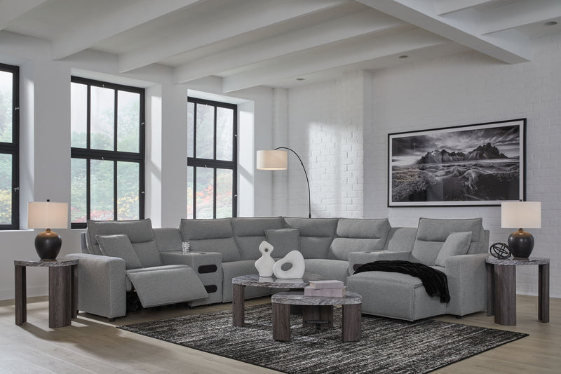 Salt and pepper reclining sectional sofa from Signature Design by Ashley® with plush cushions and modern design.