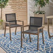 Set of two Noble House Belfast dining chairs with acacia wood frames and cushioned seats, showcasing modern, natural wood design.