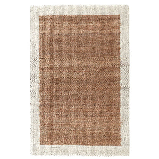 Classic Home Serene Frame Area Rug featuring a calming pattern in neutral tones, showcasing its soft woven texture.