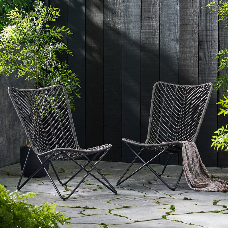 Set of two gray outdoor wicker chairs with geometric cross metal bases by Noble House, perfect for patio or garden seating.
