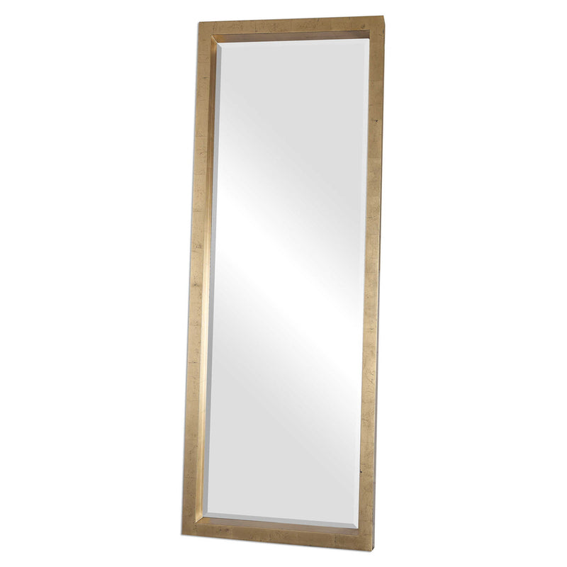 Gold Edmonton Leaner Mirror by Uttermost, floor-length mirror with sleek frame, reflecting modern home decor style.