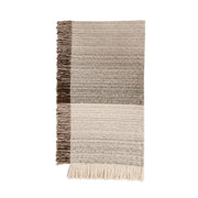 Soft beige Beryl blanket by Classic Home, displayed folded with textured fabric and cozy appearance.