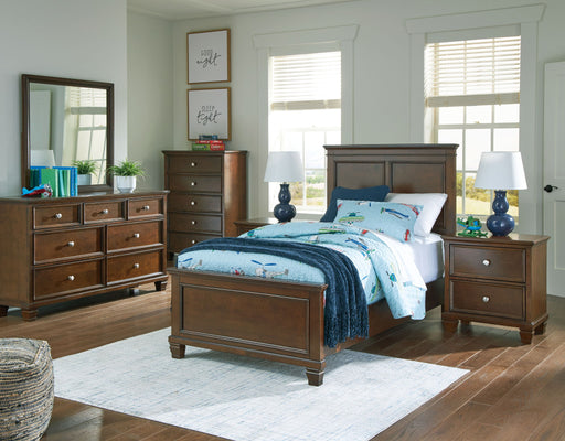 Signature Design by Ashley Danabrin 6-piece bedroom set with a panel bed, dresser, mirror, and nightstands in a modern bedroom style.