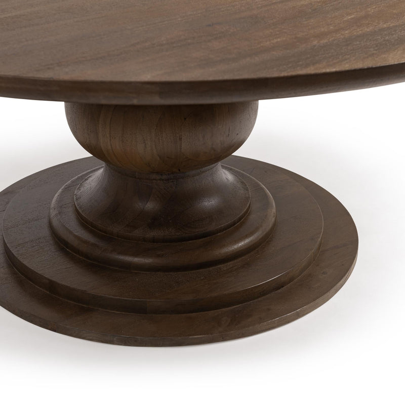 Classic Home Hera round dining table with a smooth wooden surface and sturdy legs, ideal for kitchen or dining room use.