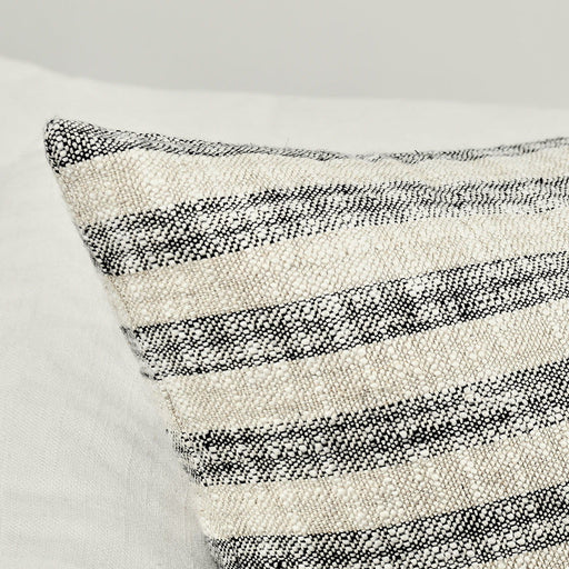 Linna 24x24 inch accent pillow by Classic Home with natural and black fabric, soft textured decorative cushion for sofa or bed.