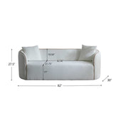 Noble House Coral curved 3-seater stationary sofa with plush cushions and modern design, shown in a stylish living room setting.