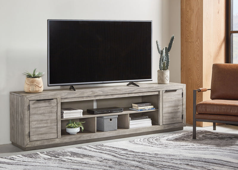 Naydell - XL TV Stand w/Fireplace Option - Gray - R&R Furniture Gallery (Fountain Valley, CA)