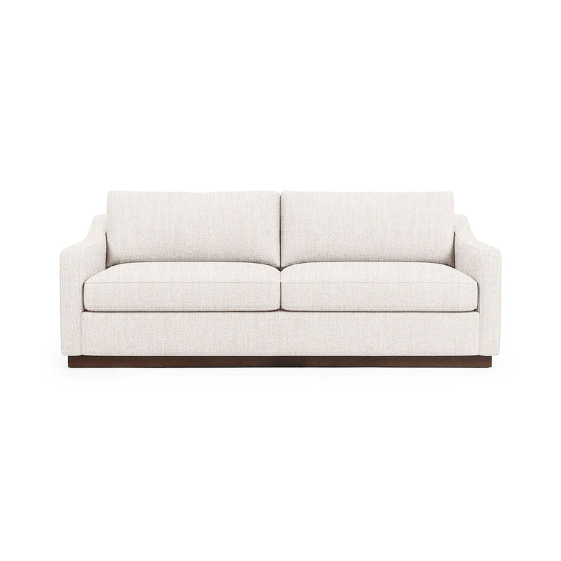 Classic Home Aspen stationary sofa with plush cushions and elegant design, shown in a cozy living room setting.