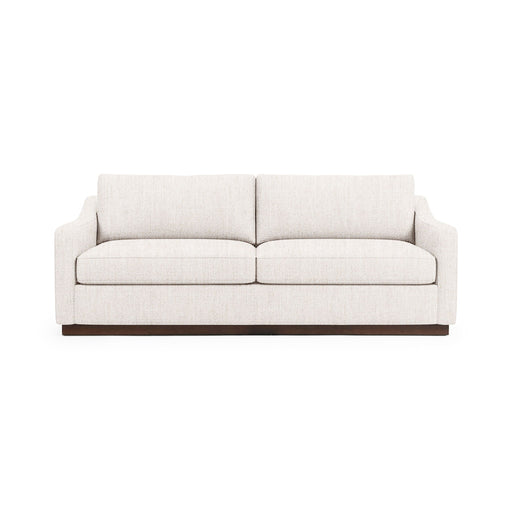 Classic Home Aspen stationary sofa with plush cushions and elegant design, shown in a cozy living room setting.