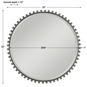 Round iron wall mirror by Uttermost featuring a sleek metal frame, perfect for modern interior decor.