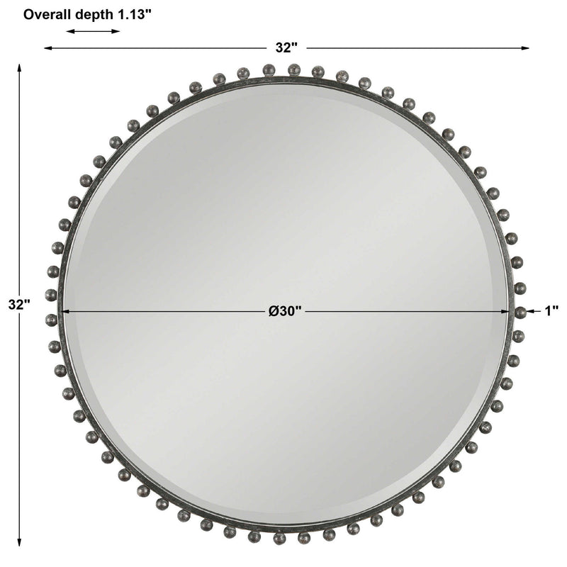 Round iron wall mirror by Uttermost featuring a sleek metal frame, perfect for modern interior decor.