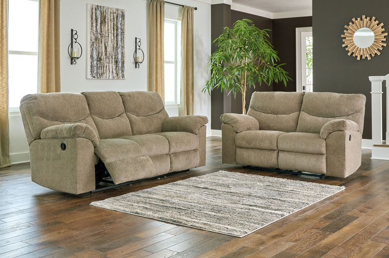 Signature Design by Ashley Alphons reclining sofa and loveseat set in a modern living room with neutral upholstery and plush cushions.