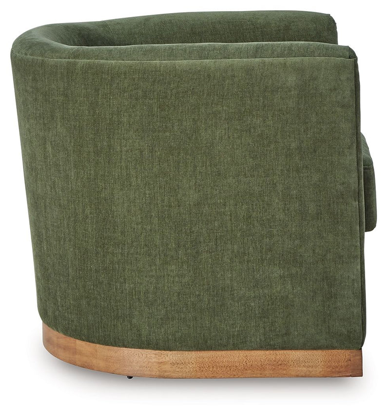 Forest green Jersonlow swivel chair by Signature Design by Ashley® with a cushioned seat and rolling base.